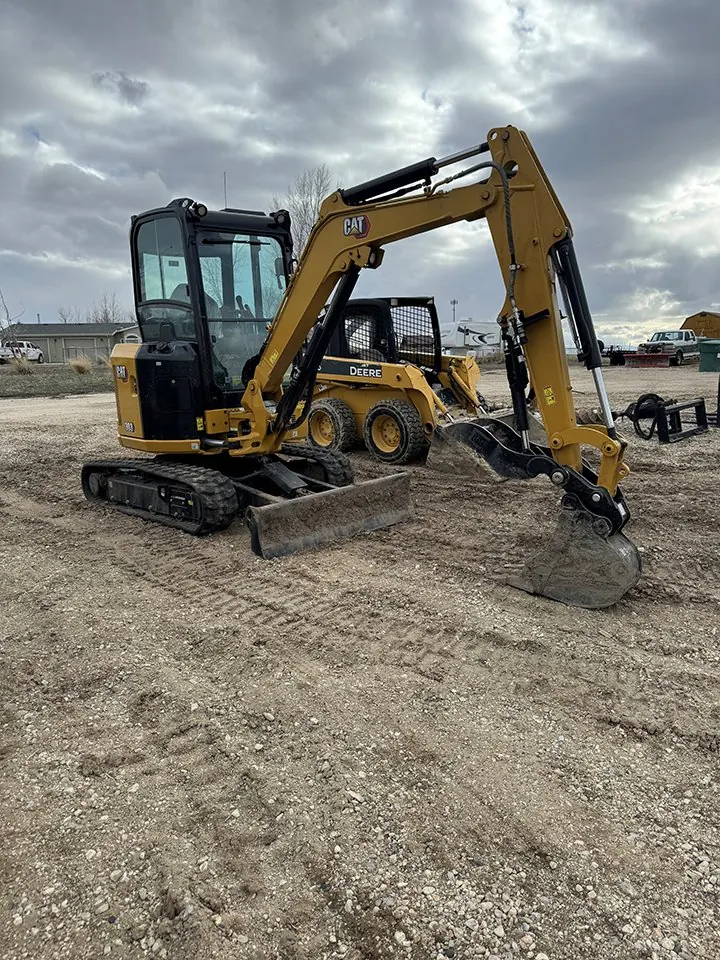 Weekend Warriors Cat 303 mini excavator with cab.